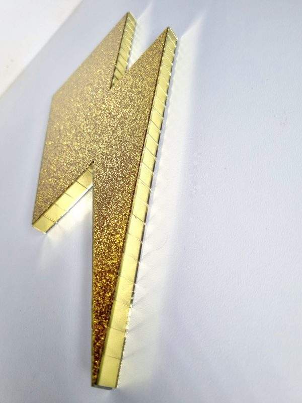 Gold glitter disco lightning bolt wall art