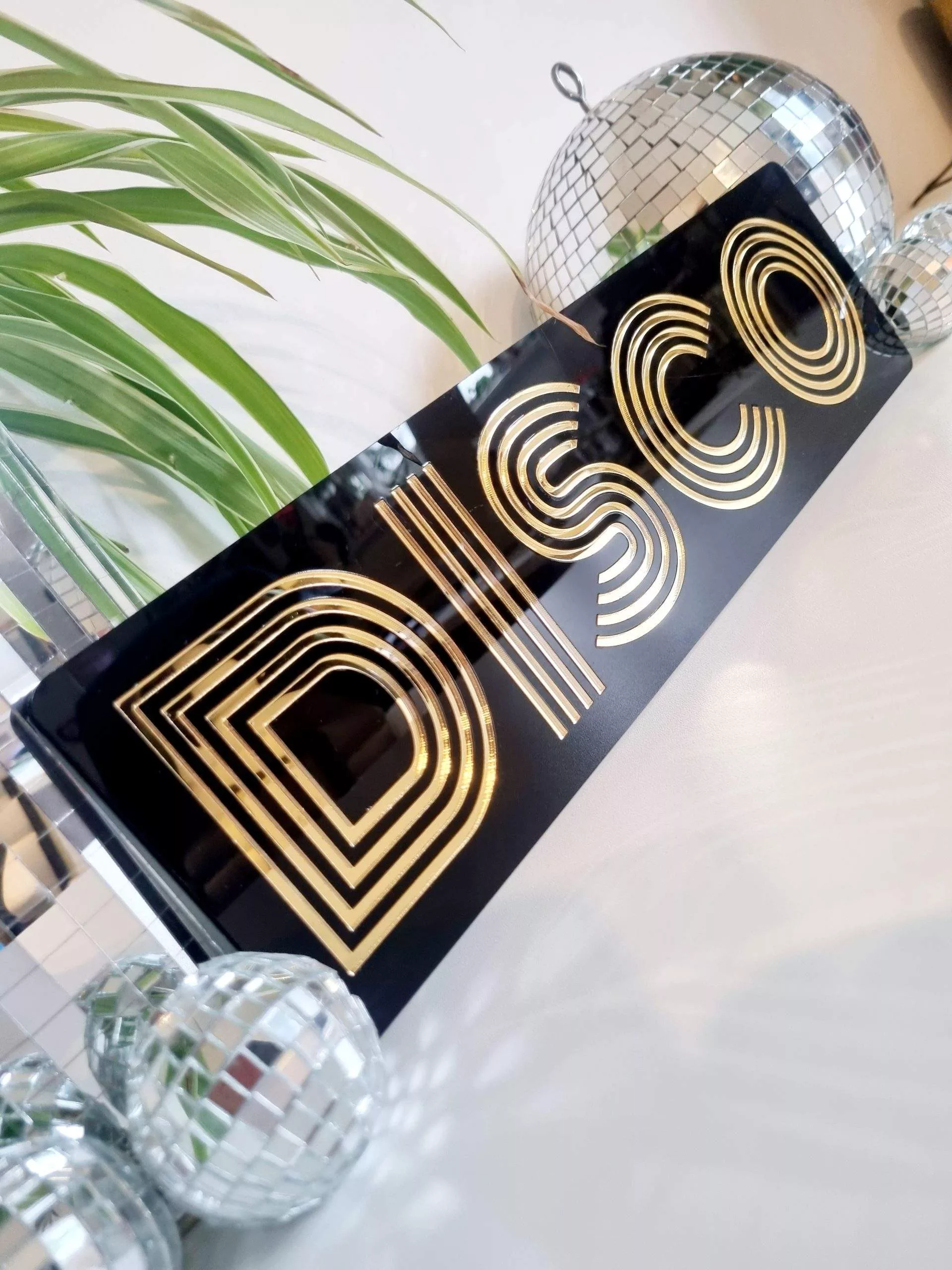 BLACK AND GOLD DISCO SIGN
