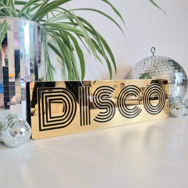 Gold and black disco mirror word art sign.