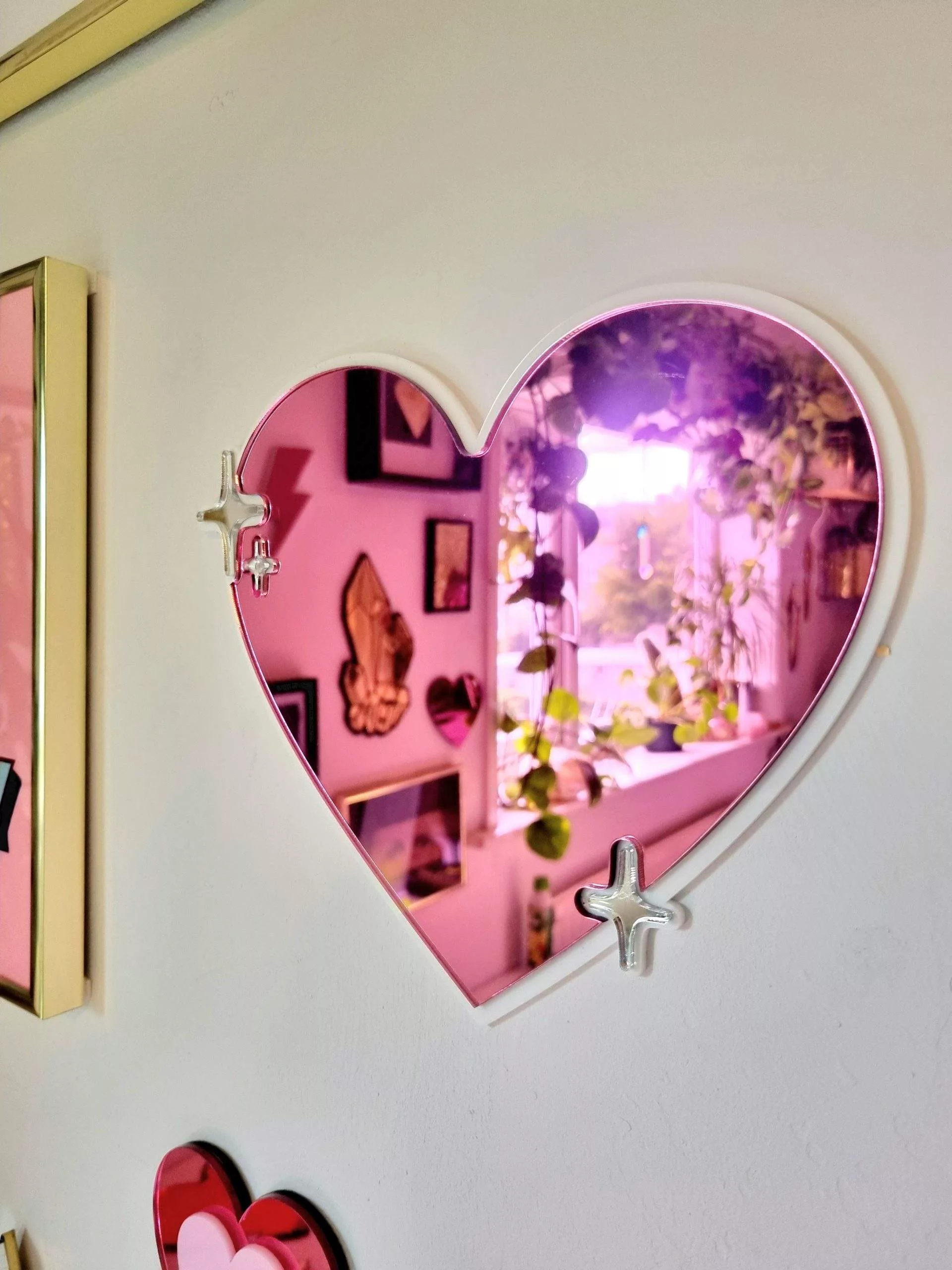 Pink pop art acrylic mirrored heart.