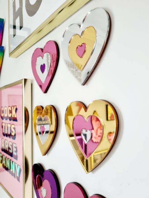 A set of 6 hearts made from gold, silver, pink and purple mirrored acrylic.