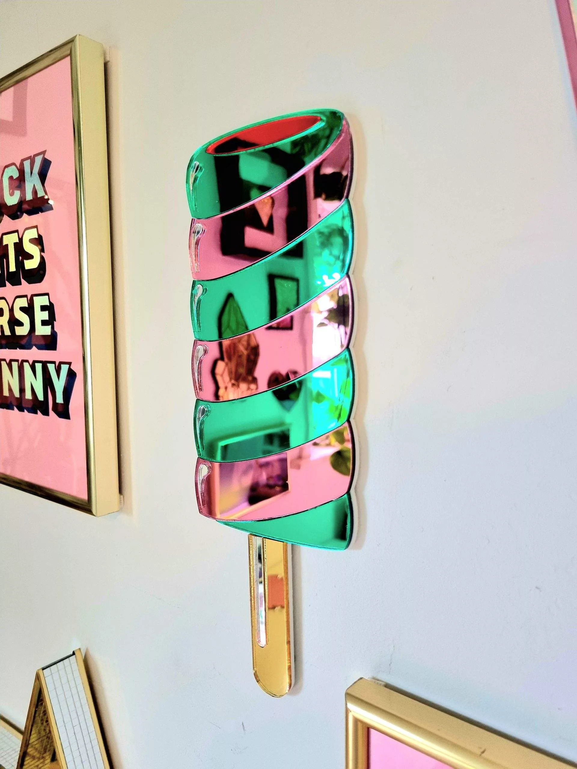 Twister ice lolly mirror wall art.