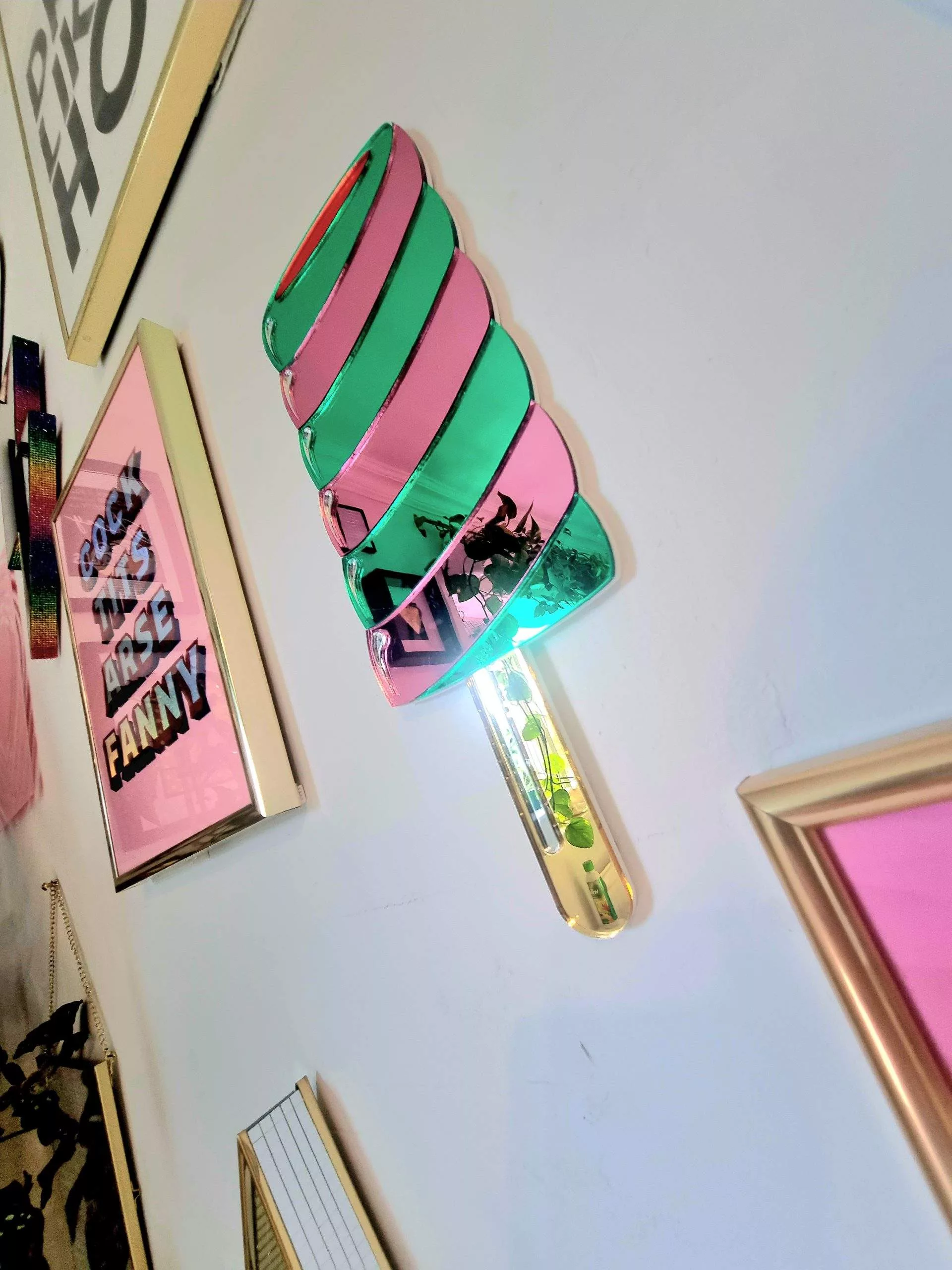 Twister ice lolly mirror wall art.