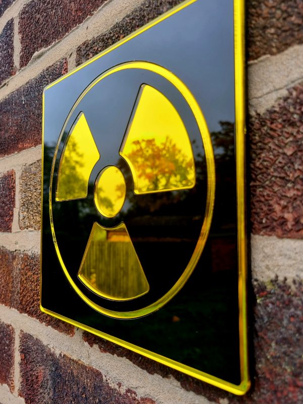 A mirror in the design of a radioactive symbol.