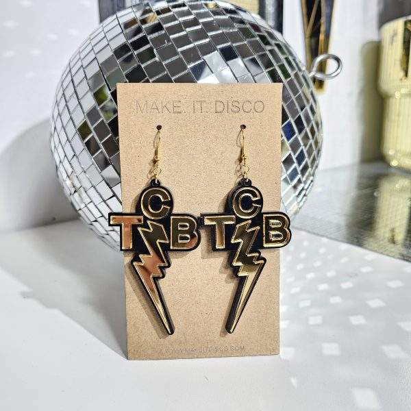 Elvis Presley TCB earrings. Handmade earrings made in the style of the iconic Taking Care of Business necklace worn by The King himself. Made with black acrylic and mirror letters and lightning bolt.