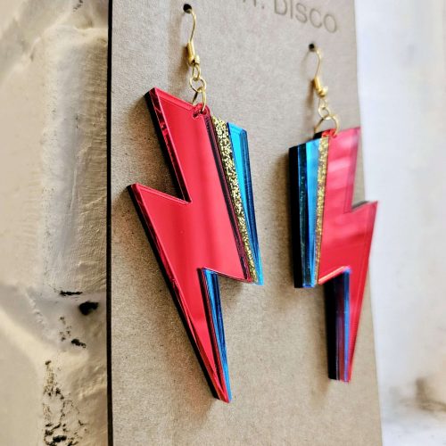 A pair of handmade earrings in the style of the lightning bolt David Bowie wore across his face.