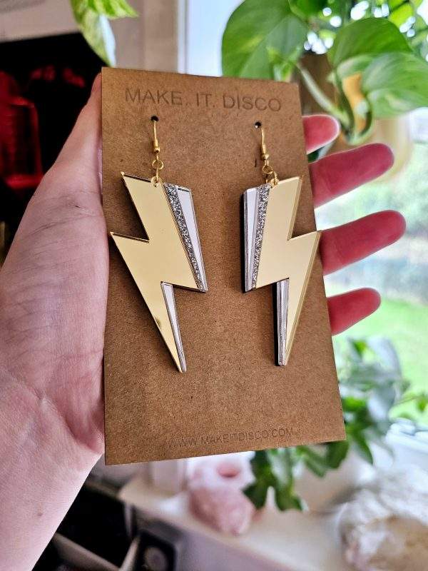 Earrings in the shape of a lightning bolt.