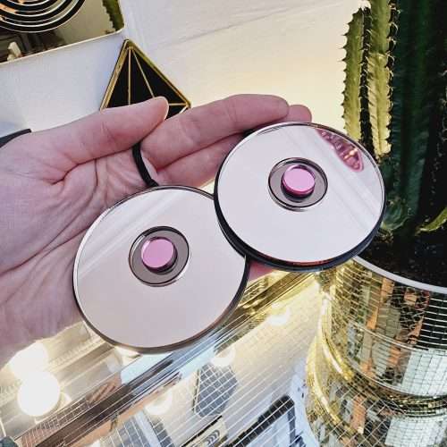 Christmas tree ornaments in the shape of a pair of boobs.