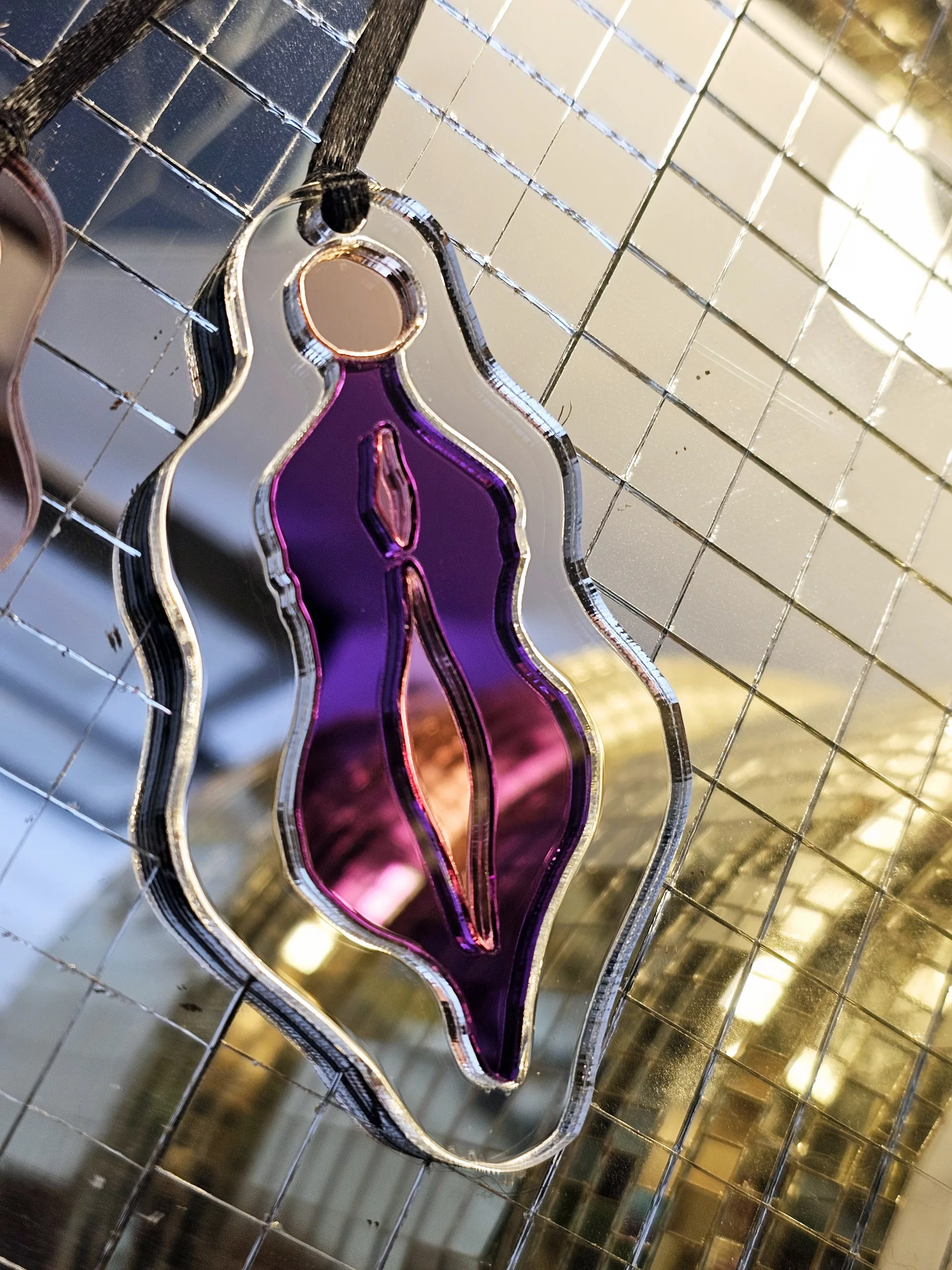 Christmas ornaments in the shape of vulvas.