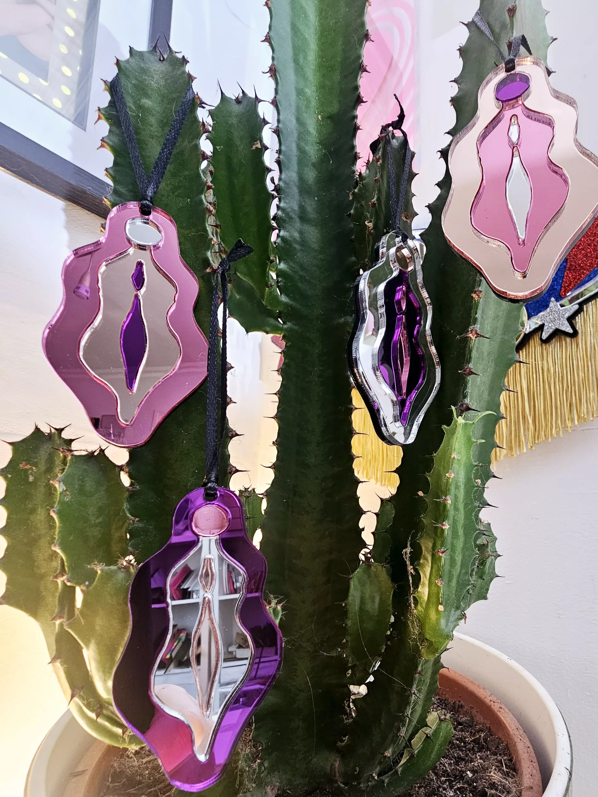 Christmas ornaments in the shape of vulvas.