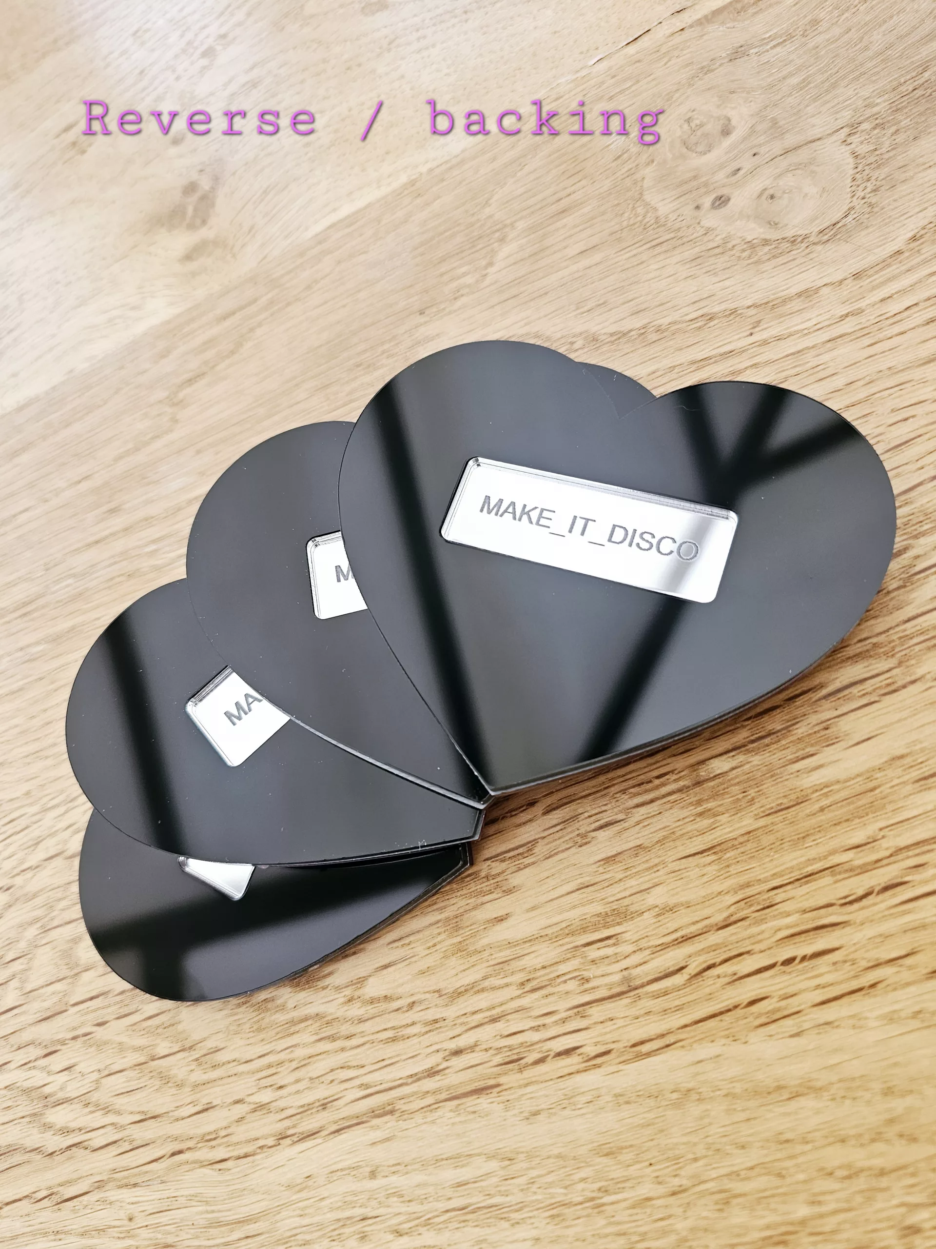A set of 4 heart mirrors.