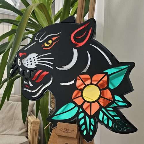 Handmade wall art in the style of an old school japanese panther tattoo. Made with matt black and mirror accents.