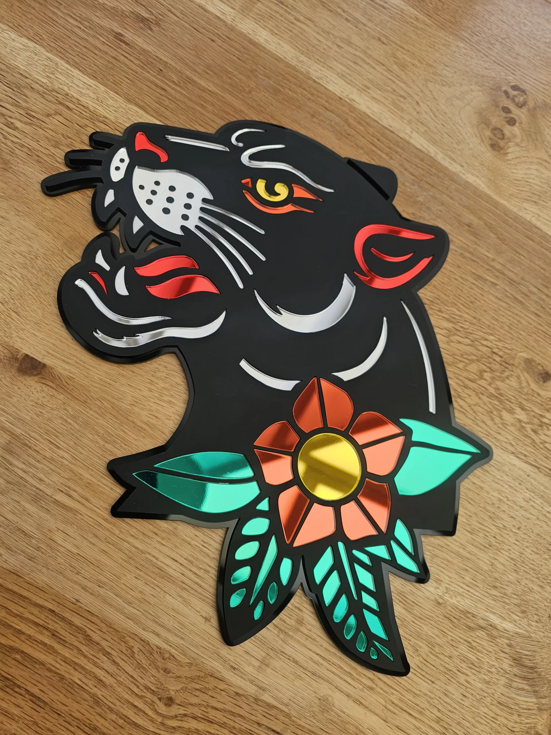 Handmade wall art in the style of an old school japanese panther tattoo. Made with matt black and mirror accents.