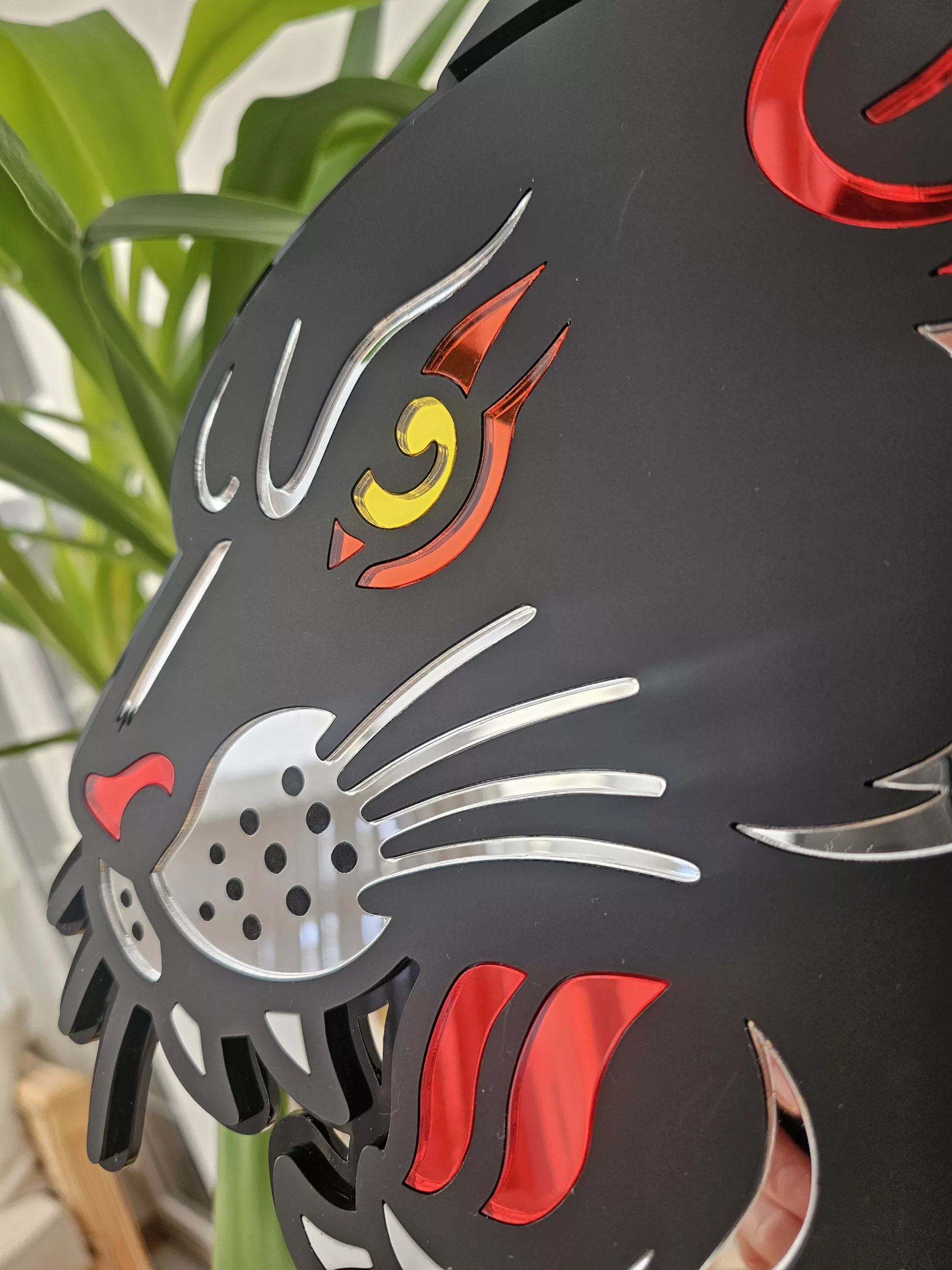 Handmade wall art in the style of an old school japanese panther tattoo. Made with matt black and mirror accents.