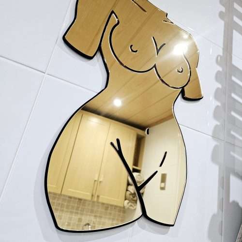 A mirror in the shape of a female silhouette.