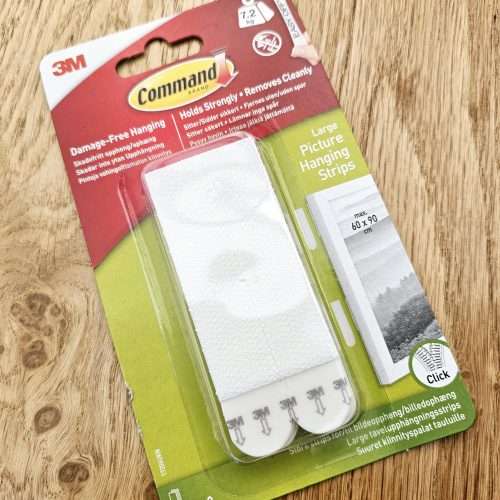 A picture of a pack of Command Picture Hanging strips.