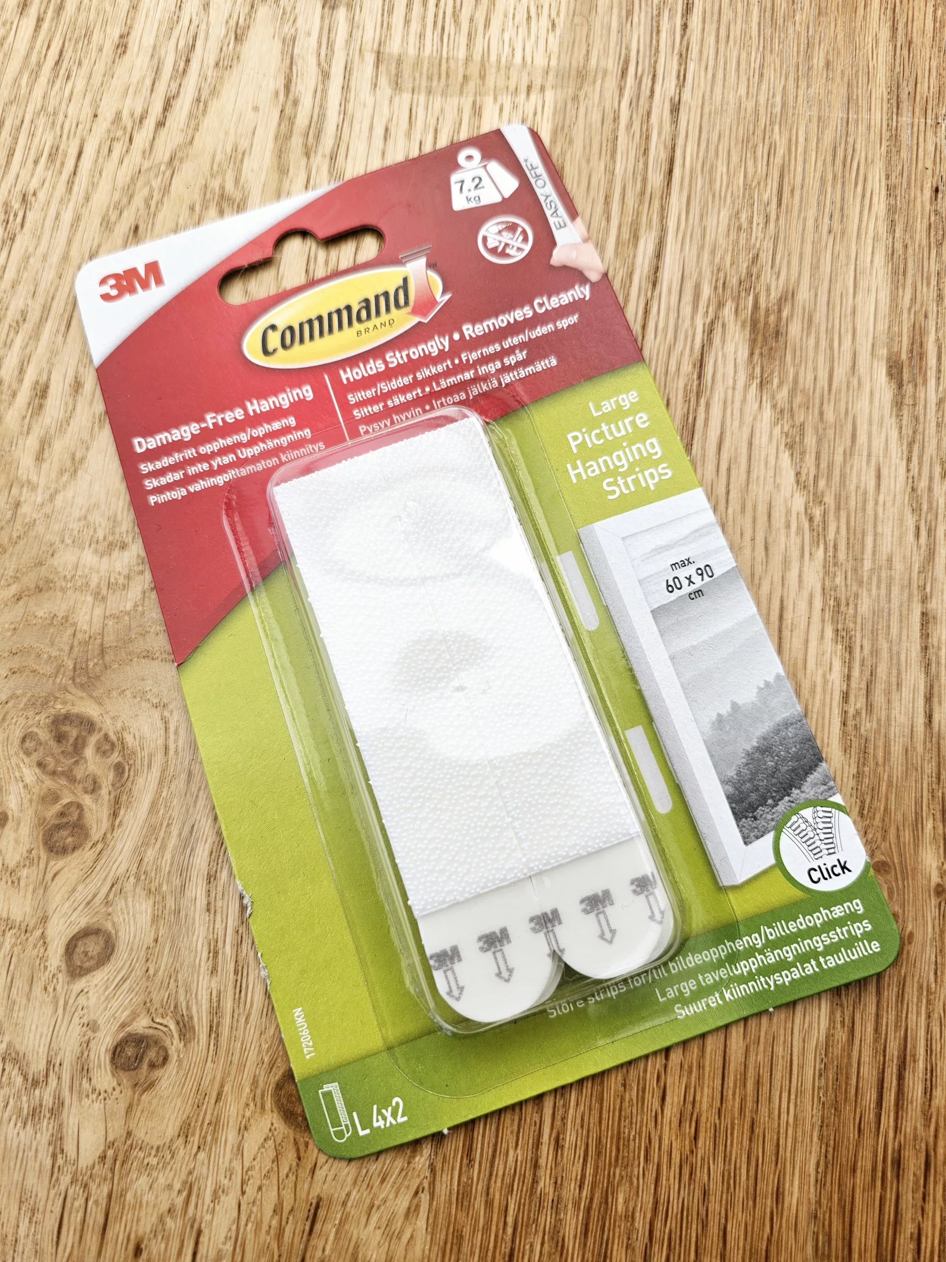 A picture of a pack of Command Picture Hanging strips.