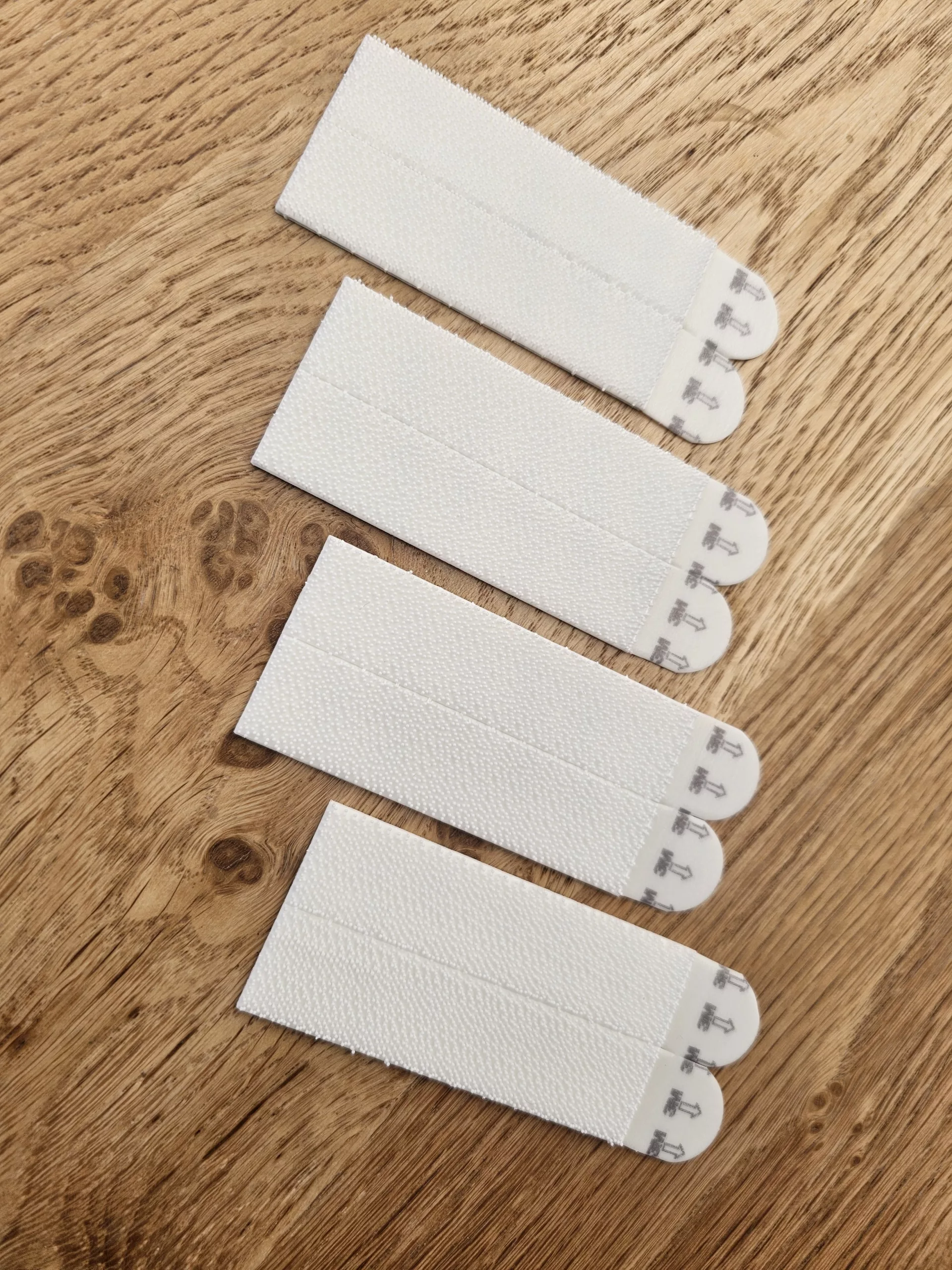 A picture of a pack of Command Picture Hanging strips.