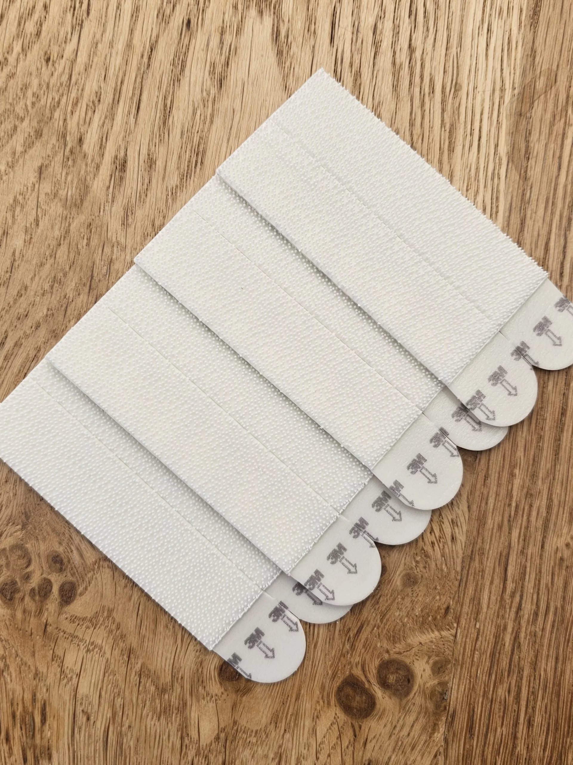 A picture of a pack of Command Picture Hanging strips.