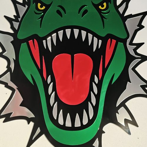 Coloured mirrored acrylic wall art in the shape of a T-Rex dinosaur